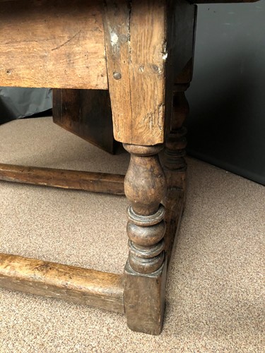 Lot 883 - A small oak refectory table, 18th century and later