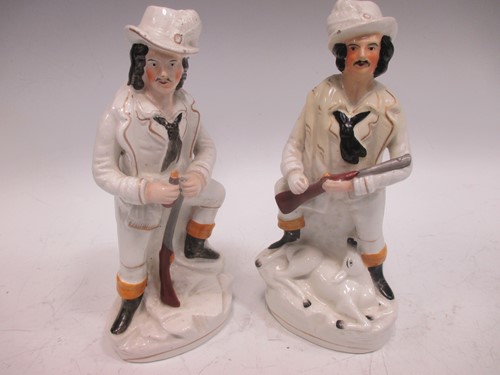 Lot 10 - Pair of Staffordshire figures of huntsmen (one...