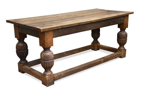 Lot 869 - An oak refectory table in 18th century style
