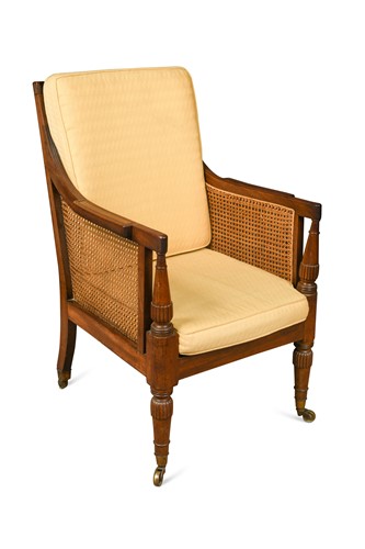 Lot 963 - A George IV mahogany library bergere