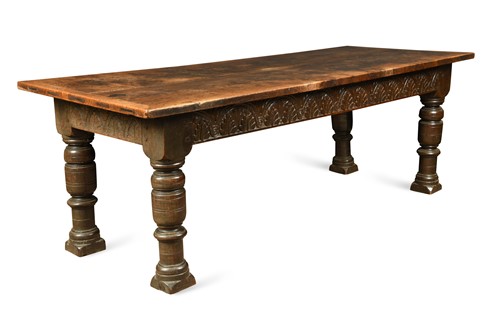 Lot 878 - A large oak and two plank top refectory table, 18th century