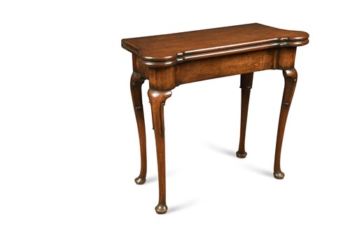 Lot 901 - George II mahogany fold over card table