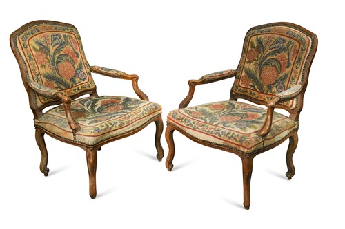 Lot 980 - A pair of Louis XV style French fauteuils, 19th century