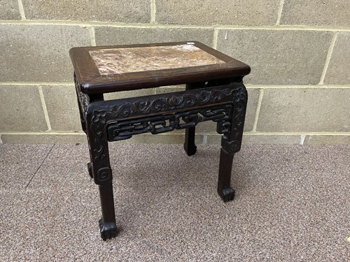 Lot 802 - A Chinese hardwood stand with inset marble...