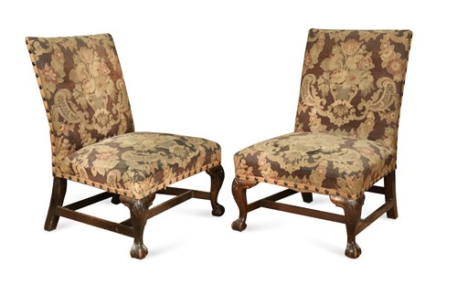 Lot 907 - A pair of George I style library chairs