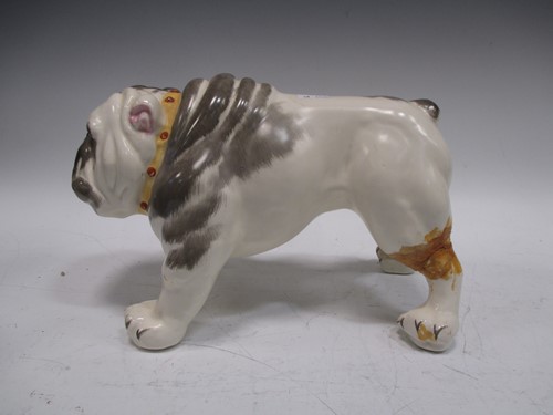 Lot 7 - A model bulldog together with three pairs of...