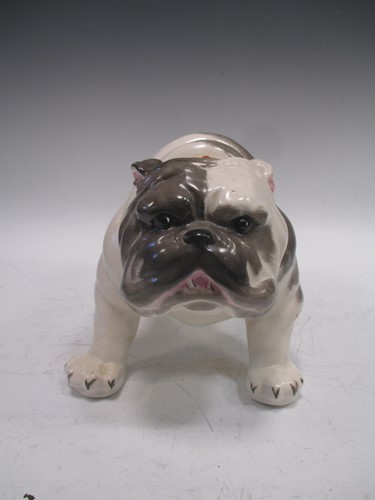 Lot 7 - A model bulldog together with three pairs of...