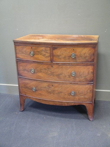 Lot 607 - A Regency mahogany bowfront chest of drawers,...