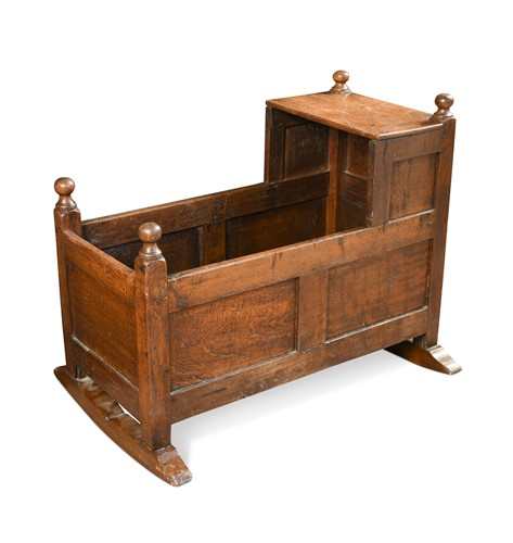 Lot 679 - An early 18th century style oak cradle