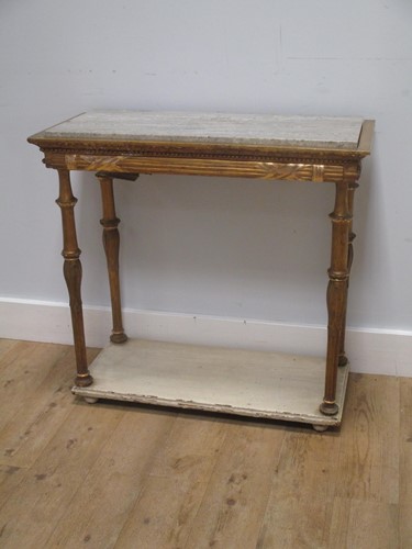 Lot 663 - A late 19th century Empire style giltwood...