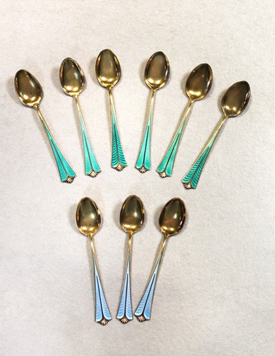 Lot 91 - David Andsersen, a set of six Norwegian metalwares silver gilt and enamel teaspoons