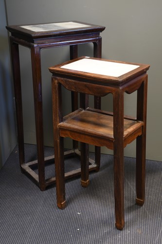Lot 444 - Two Chinese hardwood and marble inset stands