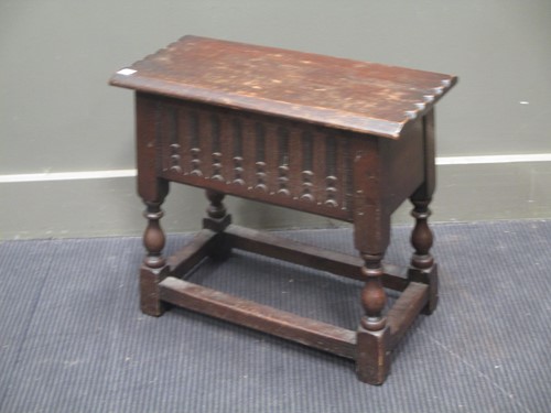 Lot 860 - An oak box stool, 51cm wide and a nest of two...
