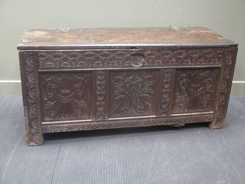 Lot 829 - An English carved oak large coffer, 66 x 143 x...