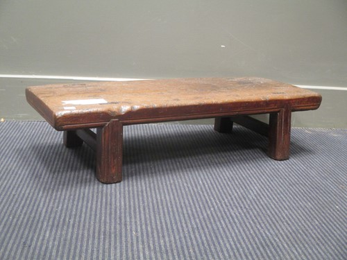 Lot 159 - A Chinese provincial low stool, late Qing...