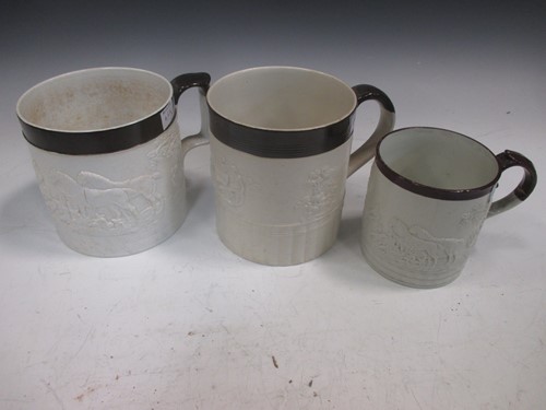 Lot 323 - Three Castleford type pottery porter mugs,...