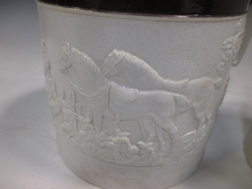 Lot 323 - Three Castleford type pottery porter mugs,...