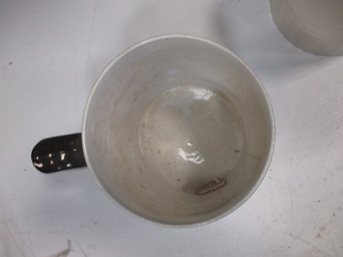 Lot 323 - Three Castleford type pottery porter mugs,...