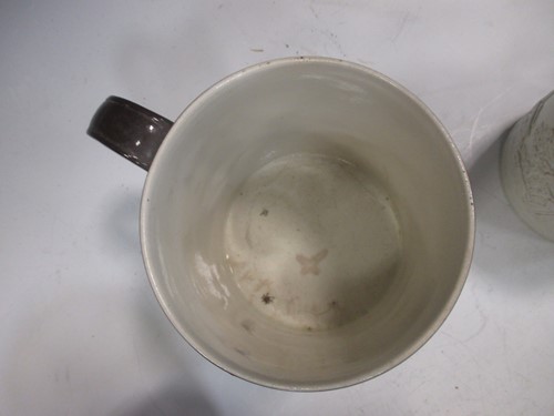 Lot 323 - Three Castleford type pottery porter mugs,...