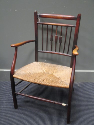 Lot 825 - A Sussex rush seated armchair, probably Morris...