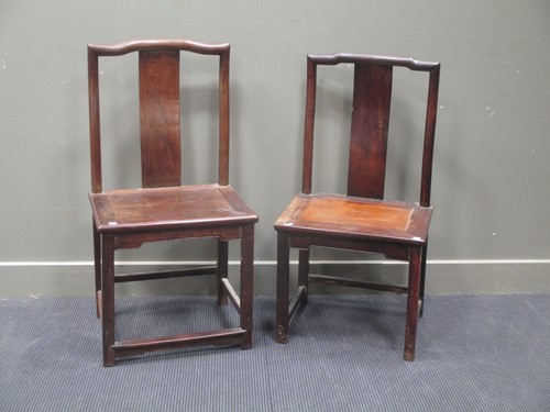 Lot 145 - Two Chinese hardwood yoke-back chairs, in Ming...
