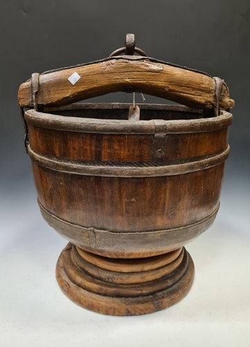 Lot 168 - A Chinese carved wood and metal mounted well...