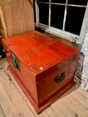 Lot 153 - An oriental red lacquered chest, perhaps...