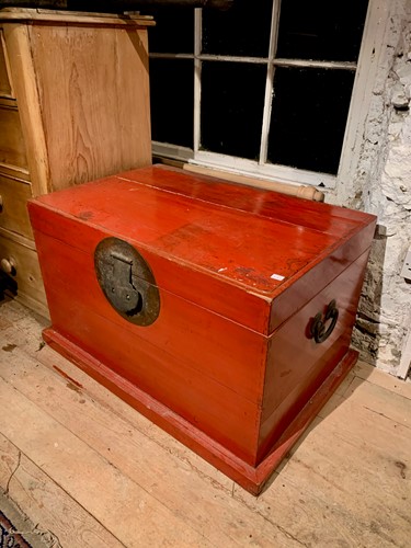 Lot 153 - An oriental red lacquered chest, perhaps...