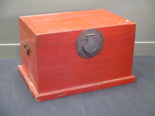 Lot 153 - An oriental red lacquered chest, perhaps...