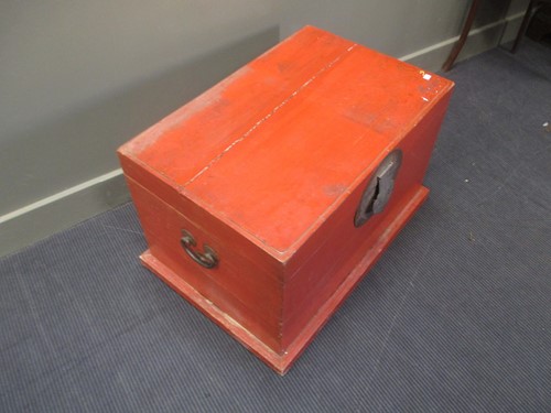 Lot 153 - An oriental red lacquered chest, perhaps...
