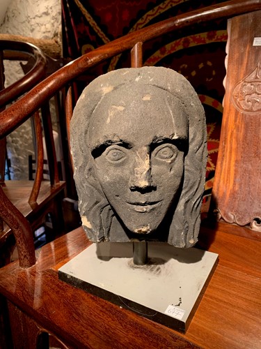 Lot 451 - A carved stone head, in medieval style, 19th century, probably English