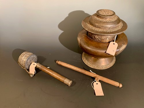 Lot 454 - A Tibetan silver and inlaid copper lidded offering jar and cover