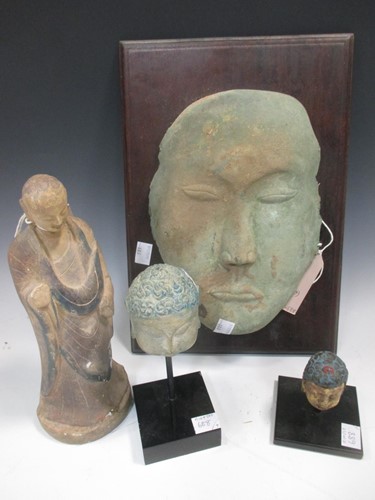 Lot 102 - A bronze mask in archaic style, possibly...