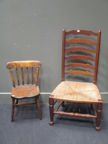 Lot 824 - A rush seated ladder back fireside chair; an...