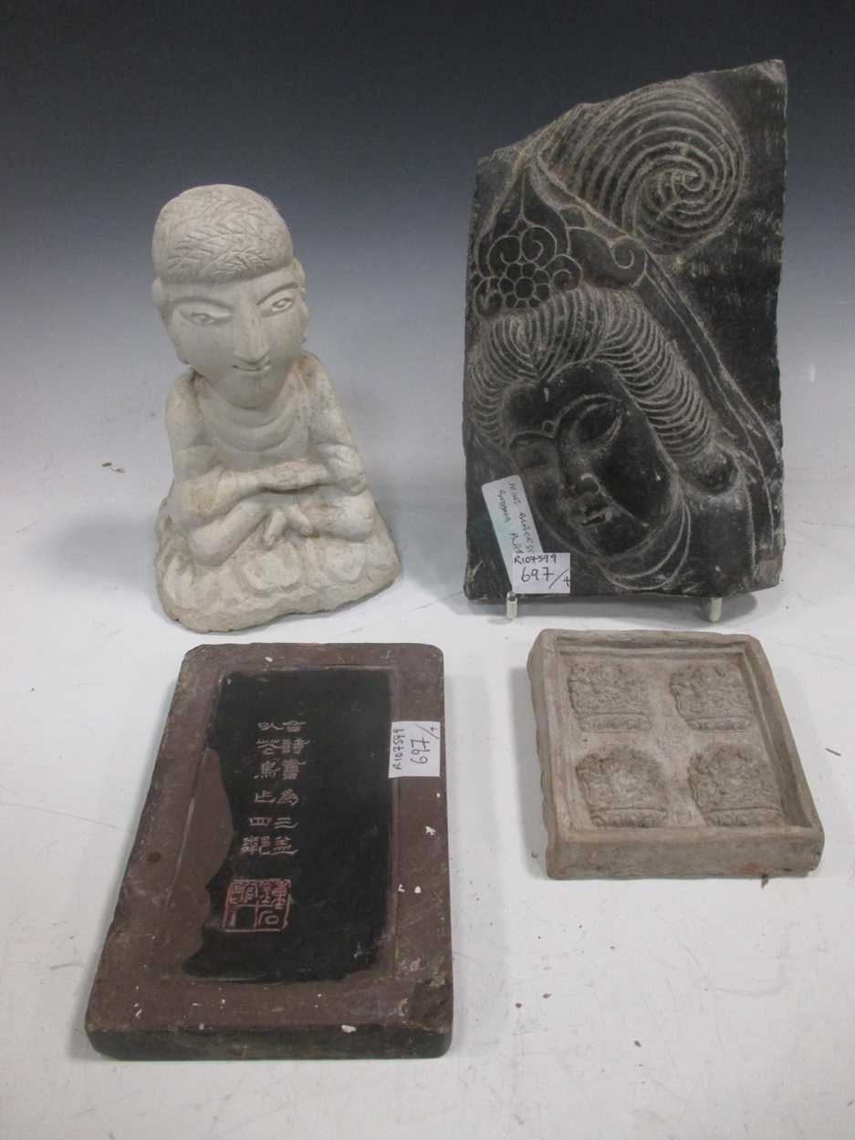 Lot 86 - A Chinese carved black stone plaque, in Ming...