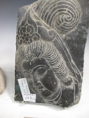 Lot 86 - A Chinese carved black stone plaque, in Ming...