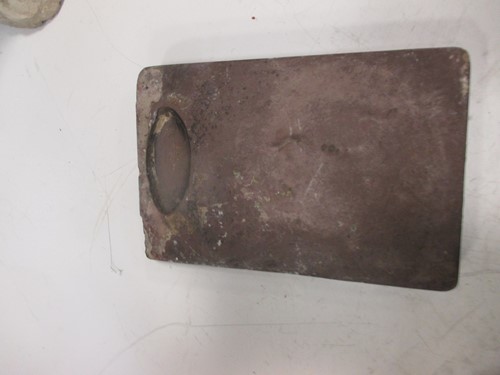 Lot 86 - A Chinese carved black stone plaque, in Ming...