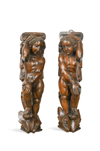 Lot 867 - A pair of carved walnut wall brackets, probably 19th century