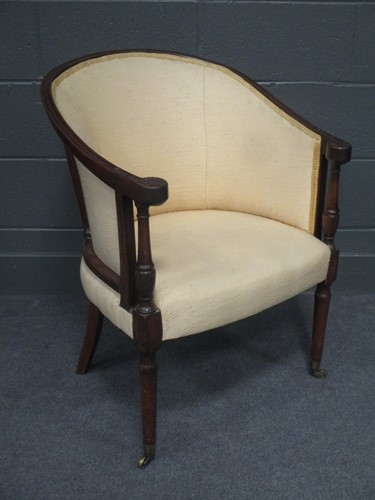 Lot 621 - A George III Hepplewhite tub armchair