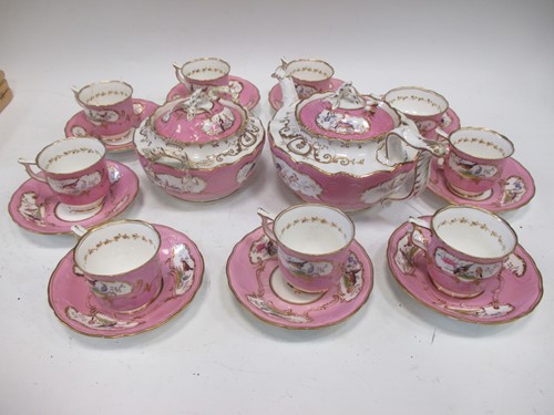 Lot 73 - An English porcelain tea service, the pink...