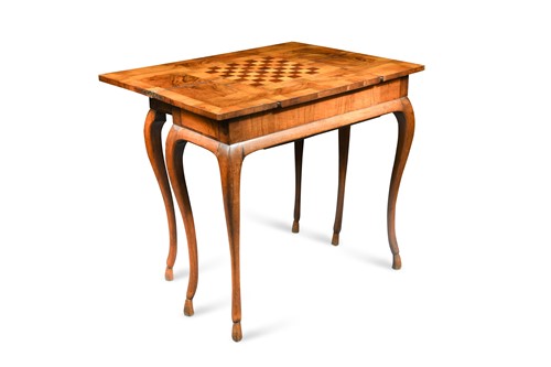 Lot 981 - A late Victorian figured walnut and floral inlaid fold-over games table