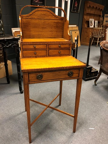 Lot 960 - A Regency style satinwood cheveret