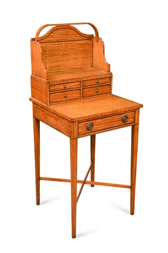 Lot 960 - A Regency style satinwood cheveret