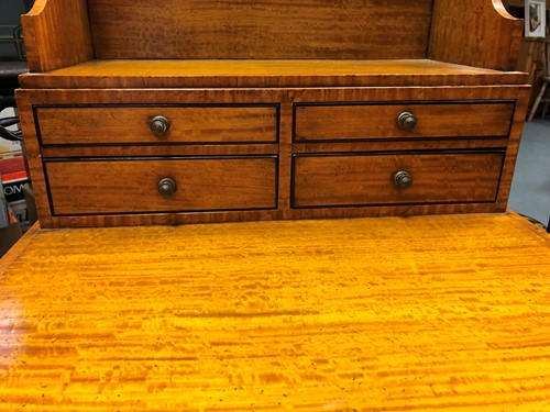 Lot 960 - A Regency style satinwood cheveret