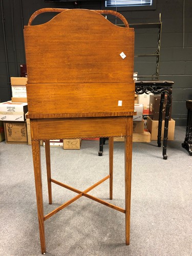 Lot 960 - A Regency style satinwood cheveret