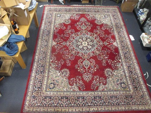 Lot 627 - A red ground North West Persian style rug 385...
