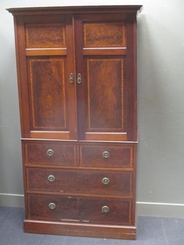 Lot 611 - An early 20th century mahogany and cross...