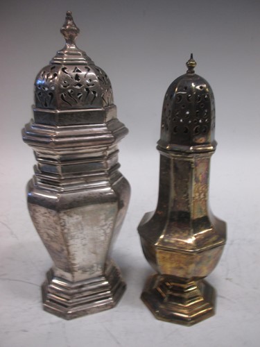 Lot 207 - Two silver sugar shakers, the larger London...