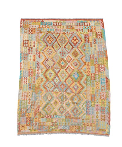 Lot 876 - A large kelim carpet