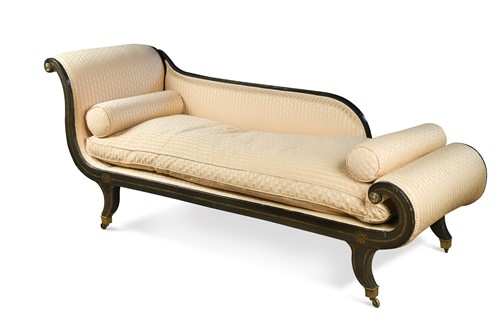 Lot 949 - A Regency ebonised and upholstered daybed